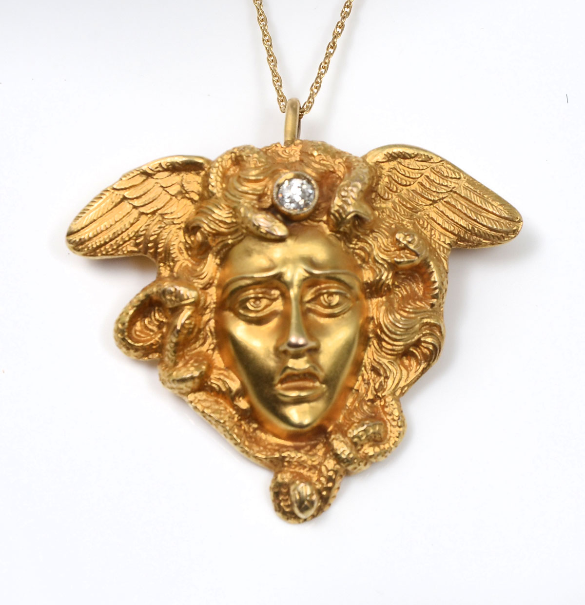 Appraisal: K BELLE EPOQUE MEDUSA PENDANT CHAIN K plumb yellow gold