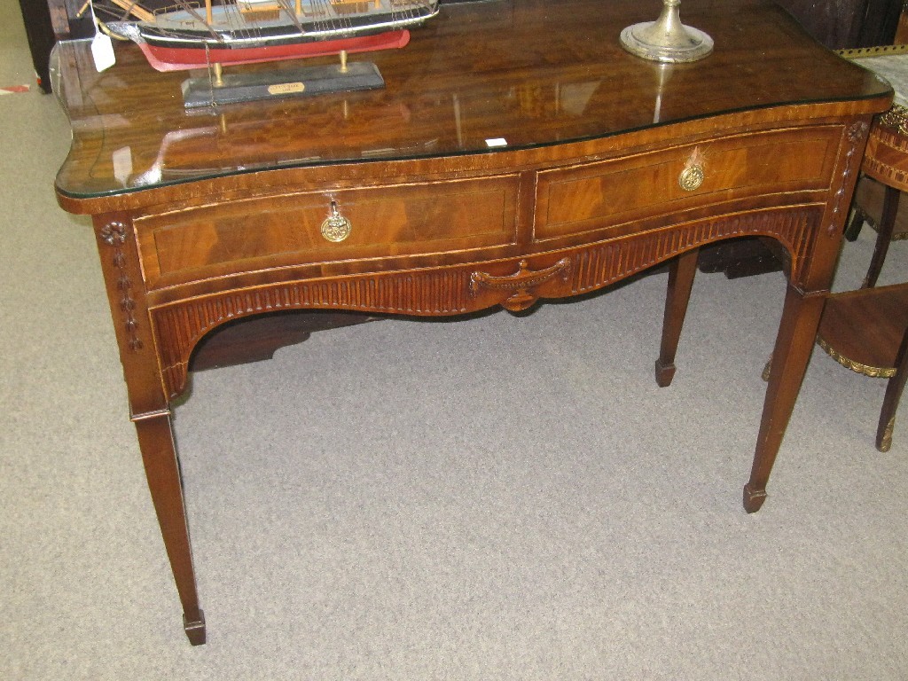 Appraisal: Mahogany serpentine front serving table