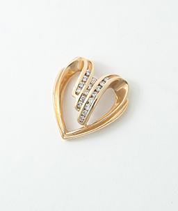 Appraisal: KARAT YELLOW GOLD AND DIAMOND HEART SHAPED SLIDE PENDANT Open