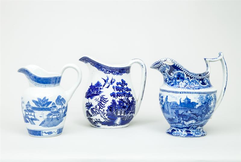 Appraisal: Three Blue Transfer-Printed Pitchers in the Willow Pattern to in