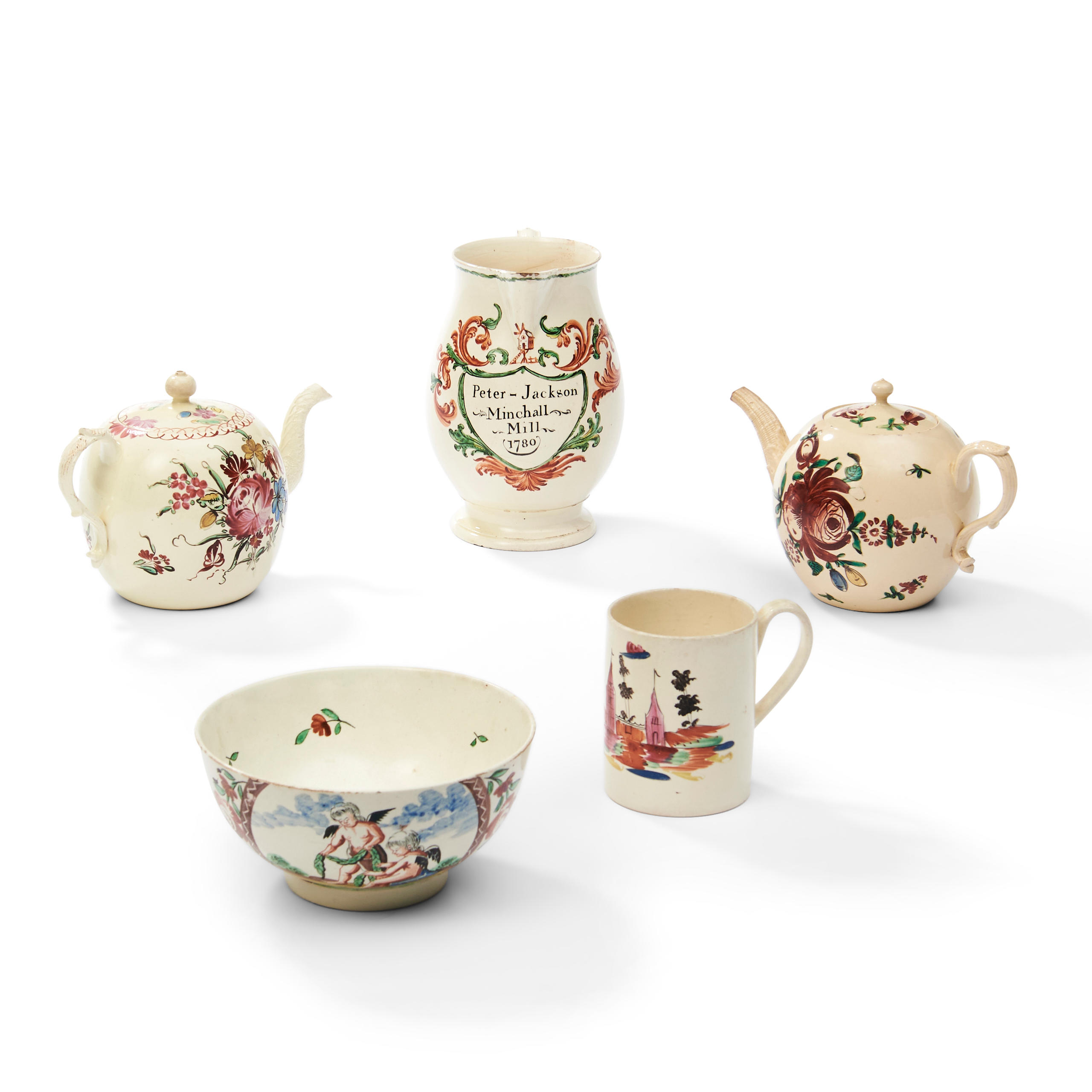 Appraisal: FIVE HAND-PAINTED CREAMWARE ITEMS two teapots a pitcher a mug