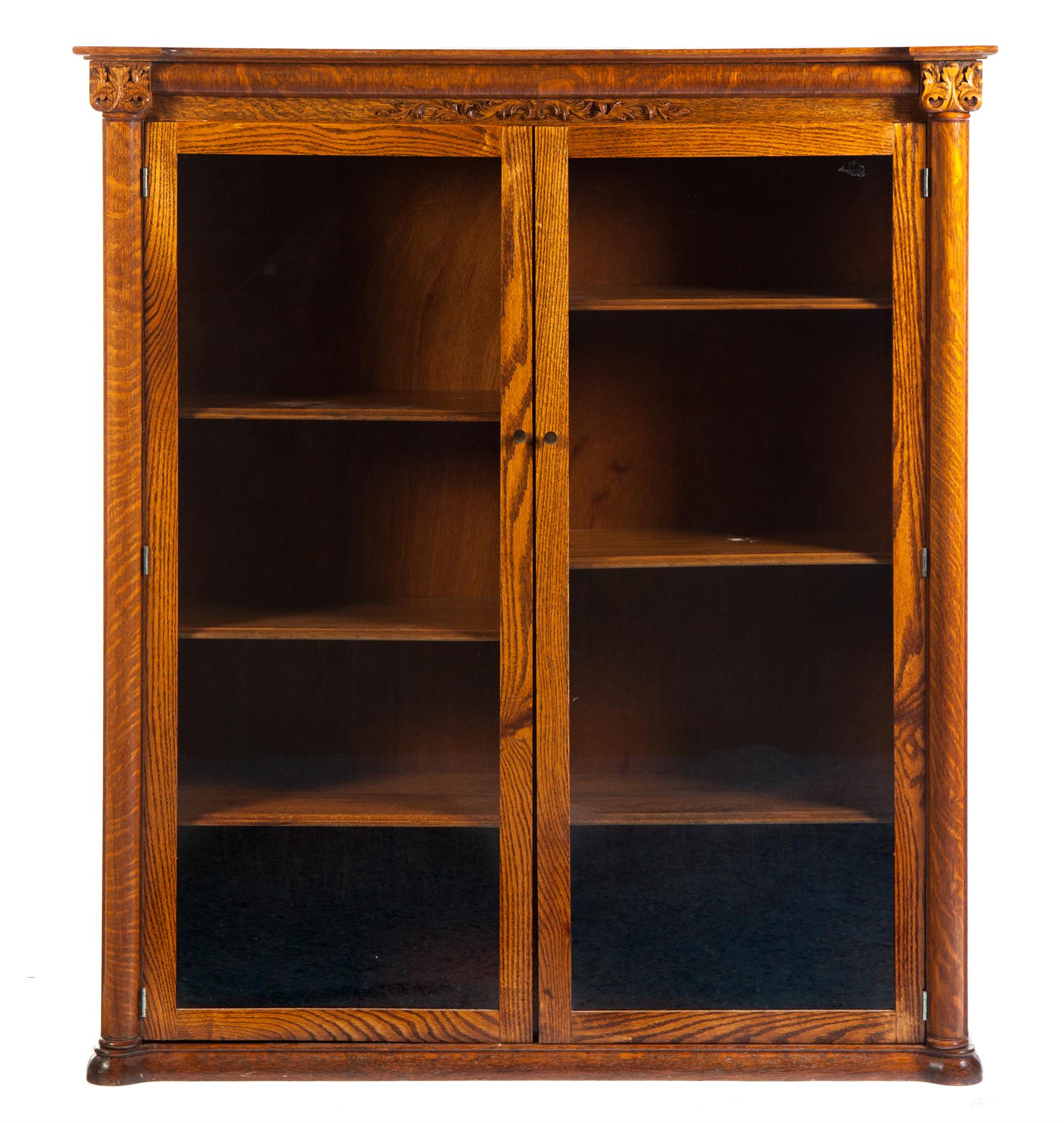 Appraisal: DOUBLE-DOOR OAK LIBRARY BOOKCASE American st quarter- th century Applied