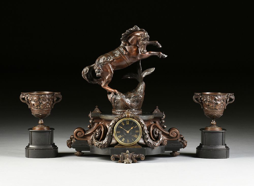 Appraisal: A BAROQUE REVIVAL THREE PIECE PATINATED METAL REARING HORSE AND