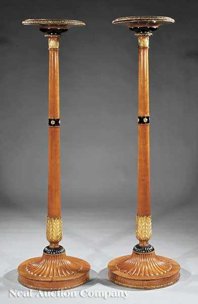 Appraisal: A Pair of Continental Neoclassical Parcel Gilt and Ebonized Fruitwood