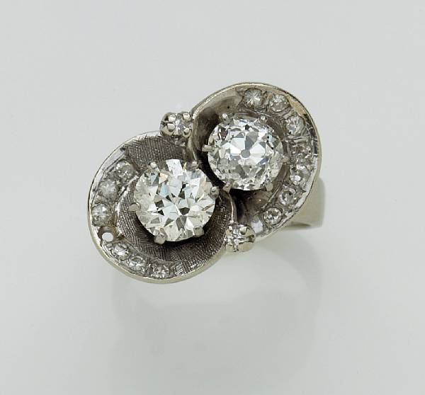 Appraisal: A diamond twin-stone ring featuring two European-cut diamonds estimated total