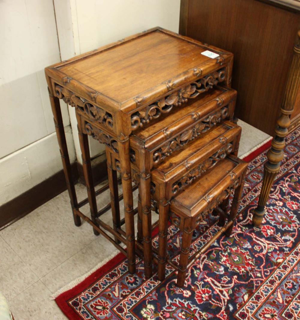 Appraisal: FOUR-PIECE CHINESE NESTING TABLES SET comprising four rectangular carved wood