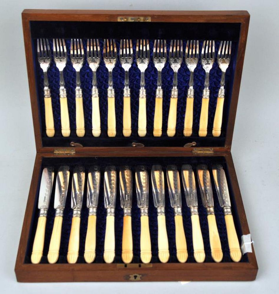 Appraisal: Cased Sheffield Bone Handled Serving Set For with engraved foliate