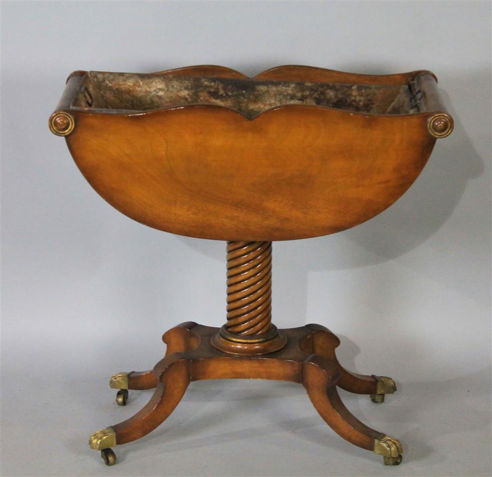 Appraisal: REGENCY STYLE MAHOGANY PLANTER in the form of a large