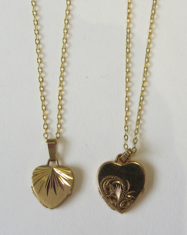 Appraisal: Two ct gold heart shaped pendant lockets with two gold