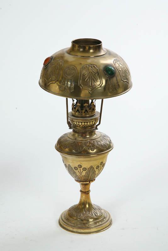 Appraisal: BRASS JUNIOR LIGHT WITH JEWELED SHADE Embossed floral and acanthus