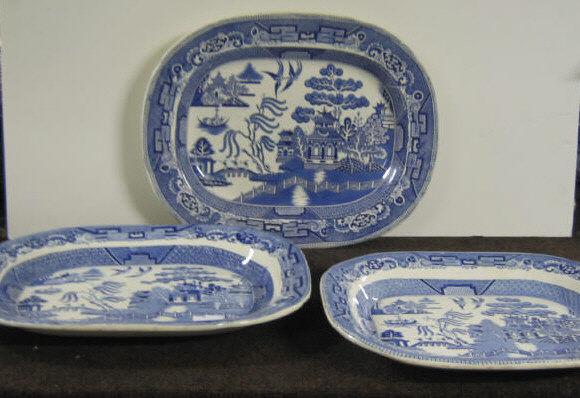 Appraisal: THREE STAFFORDSHIRE BLUE AND WHITE PLATTERS Transfer decorated ironstone in