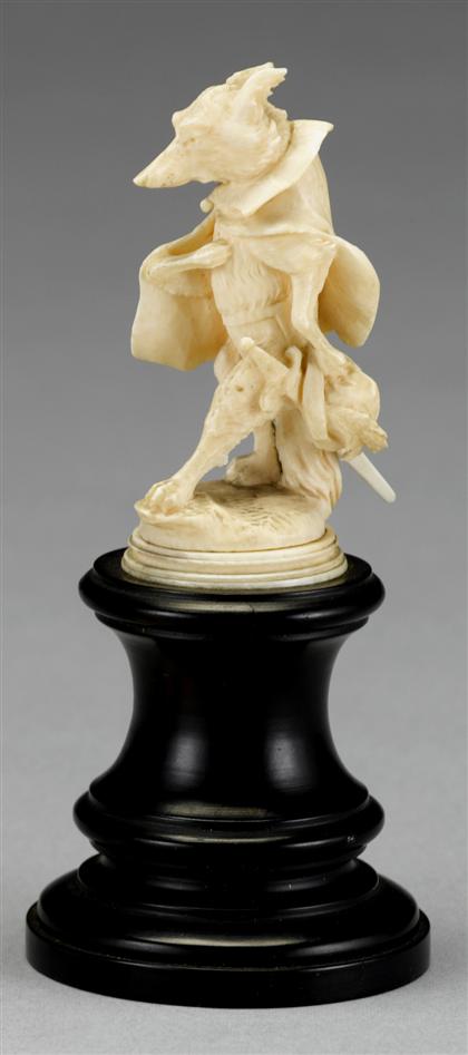 Appraisal: Continental carved ivory figure of a fox th century Depicted