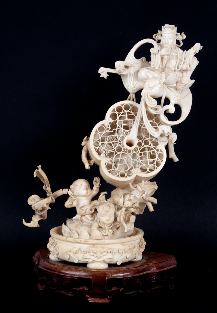 Appraisal: Chinese carved ivory figural group figural group depicting Chinese legend