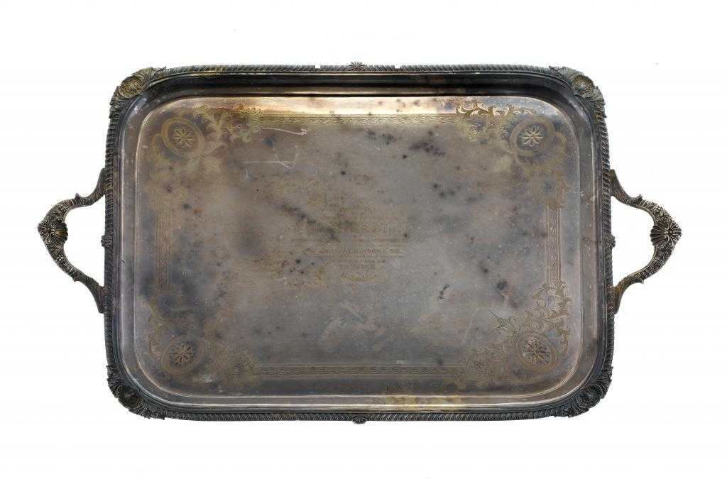 Appraisal: A VICTORIAN TEA TRAY engraved with paterae and husks in