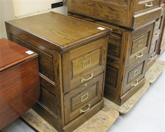 Appraisal: SET OF THREE OAK TWO-DRAWER FILE CABINETS American antique reproductions