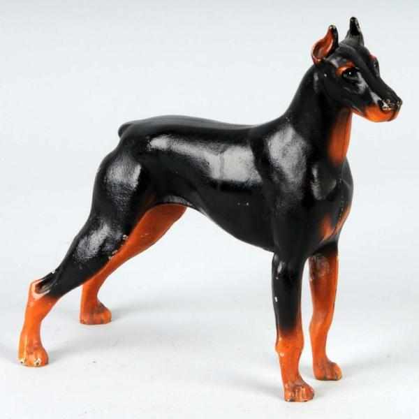 Appraisal: Cast Iron Doberman Pincher Doorstop Description Made by Hubley Condition