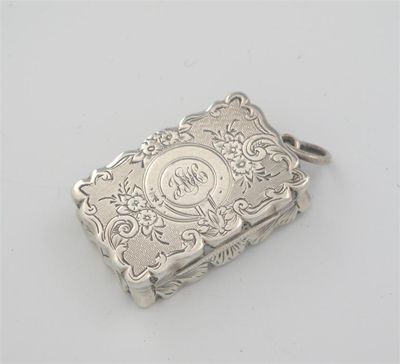 Appraisal: A Victorian engraved vinaigrette with sections of various engine turned