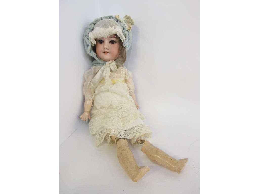 Appraisal: Bisque headed doll with composition body lower left leg detached