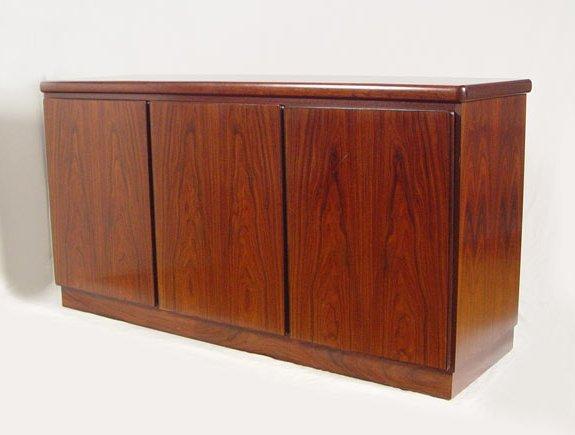 Appraisal: RASMUS DANISH MODERN ROSEWOOD VENEER CREDENZA Three door sideboard Adjustable