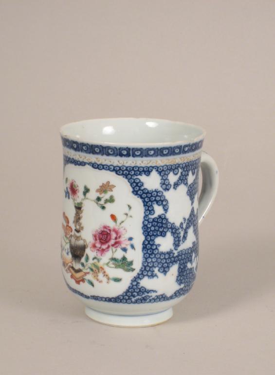 Appraisal: A Chinese polychrome bell shape Mug with reserve of vase