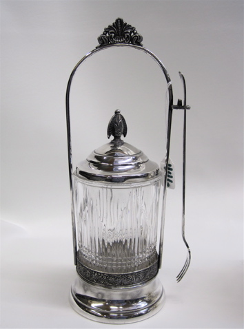 Appraisal: VICTORIAN SILVER PLATE PICKLE CASTOR with molded glass fitted in