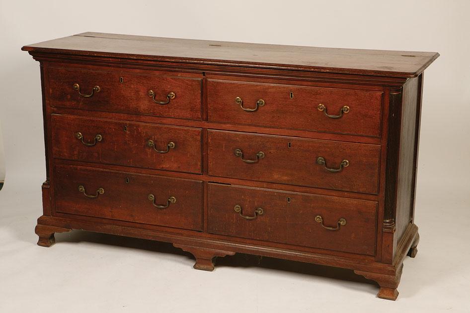 Appraisal: A GEORGE III MAHOGANY LANCASHIRE MULE CHEST with a rising