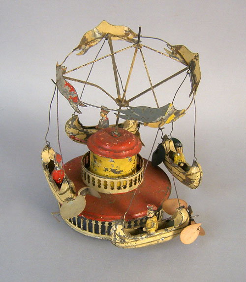 Appraisal: Early tin clockwork Merry Go Round toy th c h