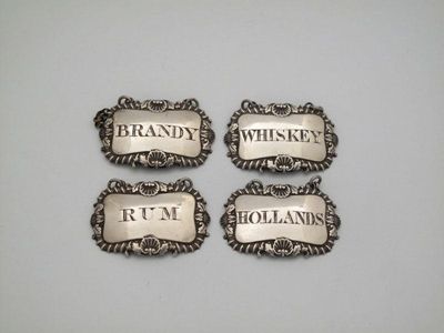 Appraisal: A set of four George III silver wine labels by