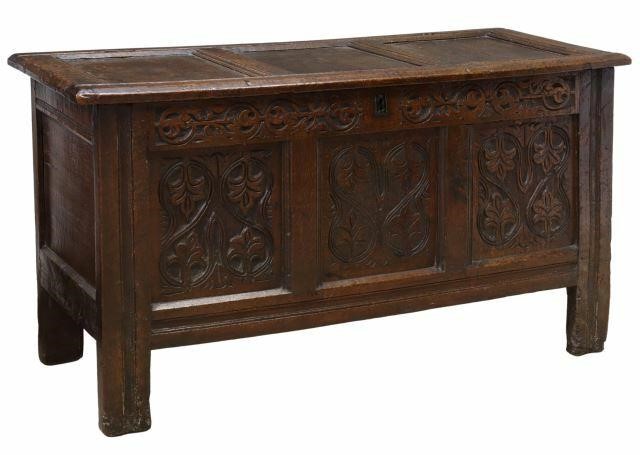 Appraisal: English carved oak storage chest th c hinged top open