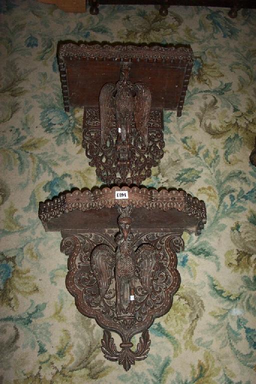 Appraisal: Two similar th century Indian padouk wood wall brackets each