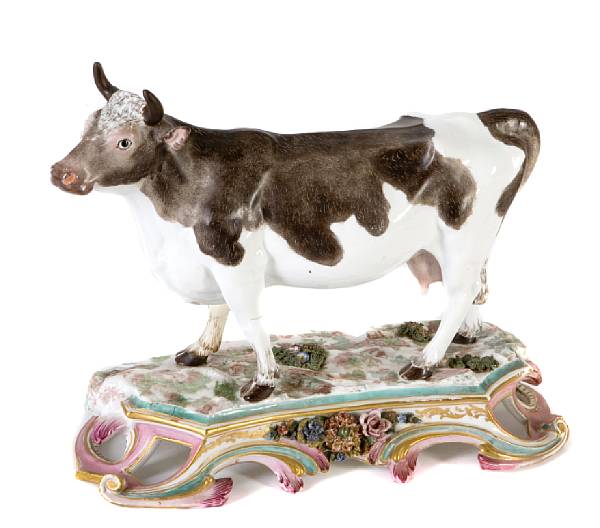 Appraisal: A German porcelain model of a cow height in width