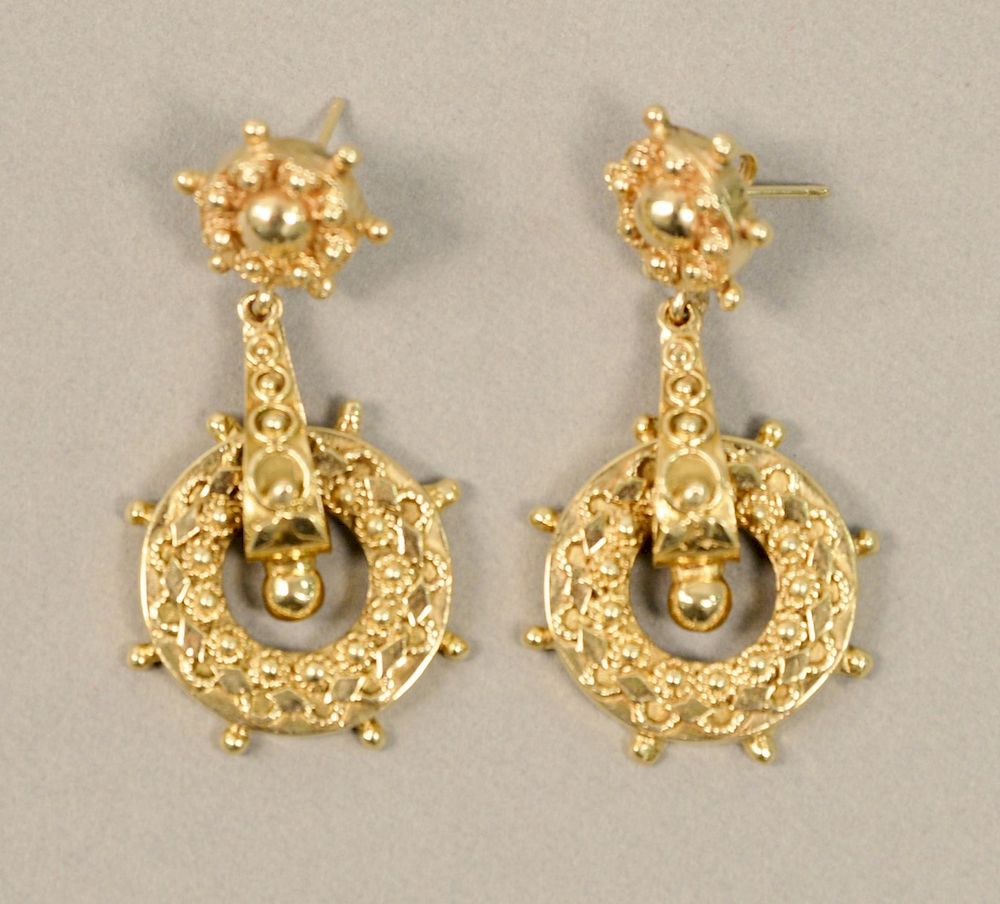 Appraisal: Pair of K gold pierced earrings with ships wheel design