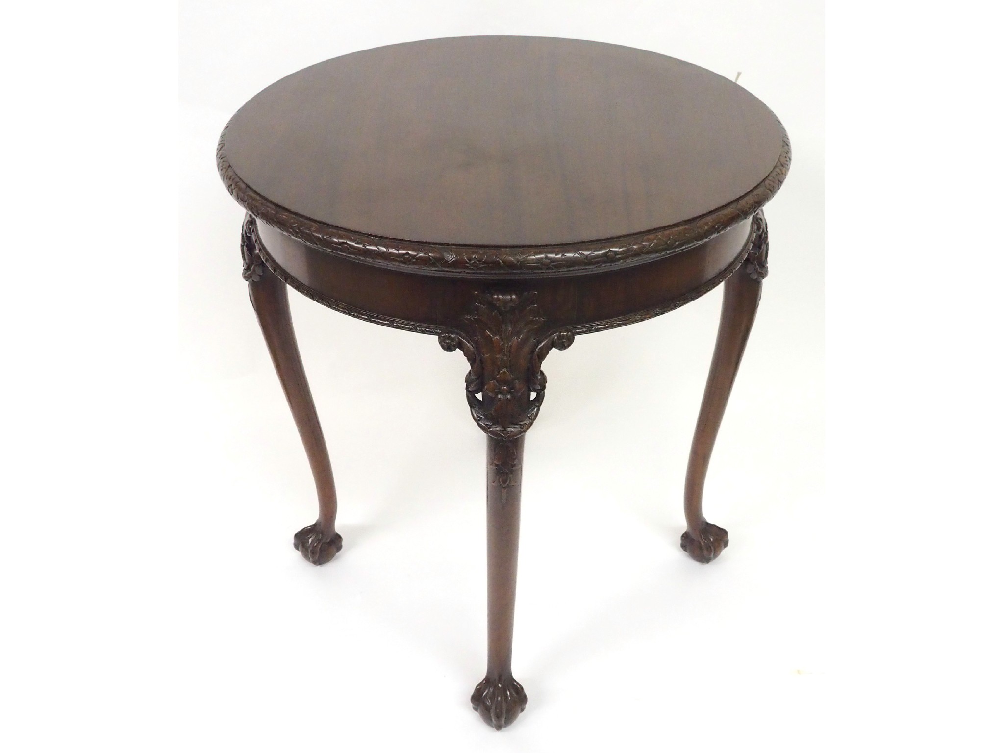 Appraisal: A mahogany circular occasional table by Waring Gillows of Lancasterwith