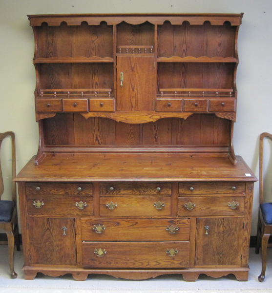 Appraisal: COUNTRY PINE HUTCH American early th century antique reproduction in