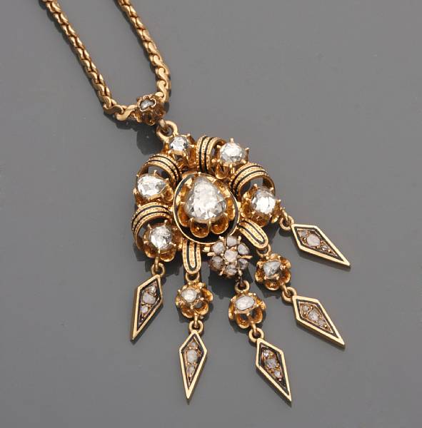 Appraisal: A Victorian rose-cut diamond and gold pendant with k gold