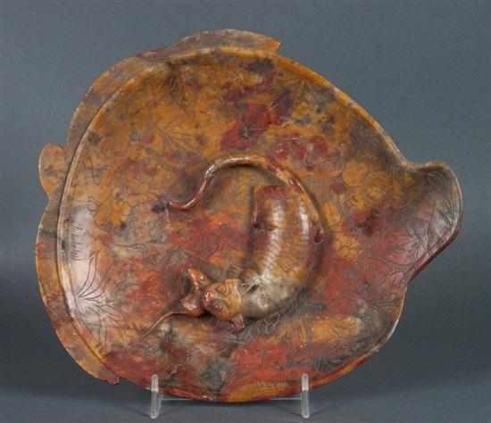 Appraisal: Chinese pomegranate-form scholar's dish late th century relief cat catching