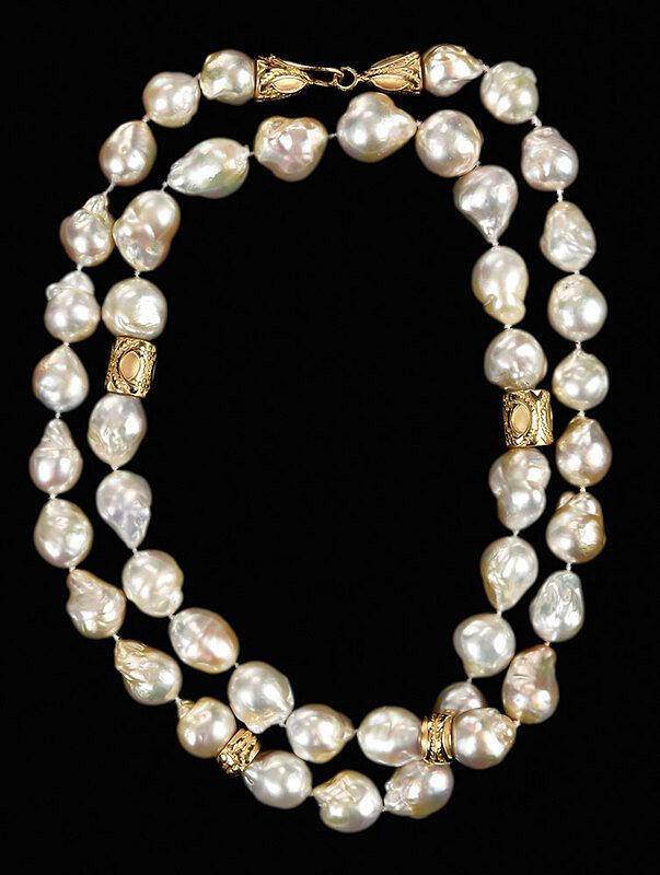 Appraisal: kt Pearl Necklace knotted baroque pearls four gold spacers clasp