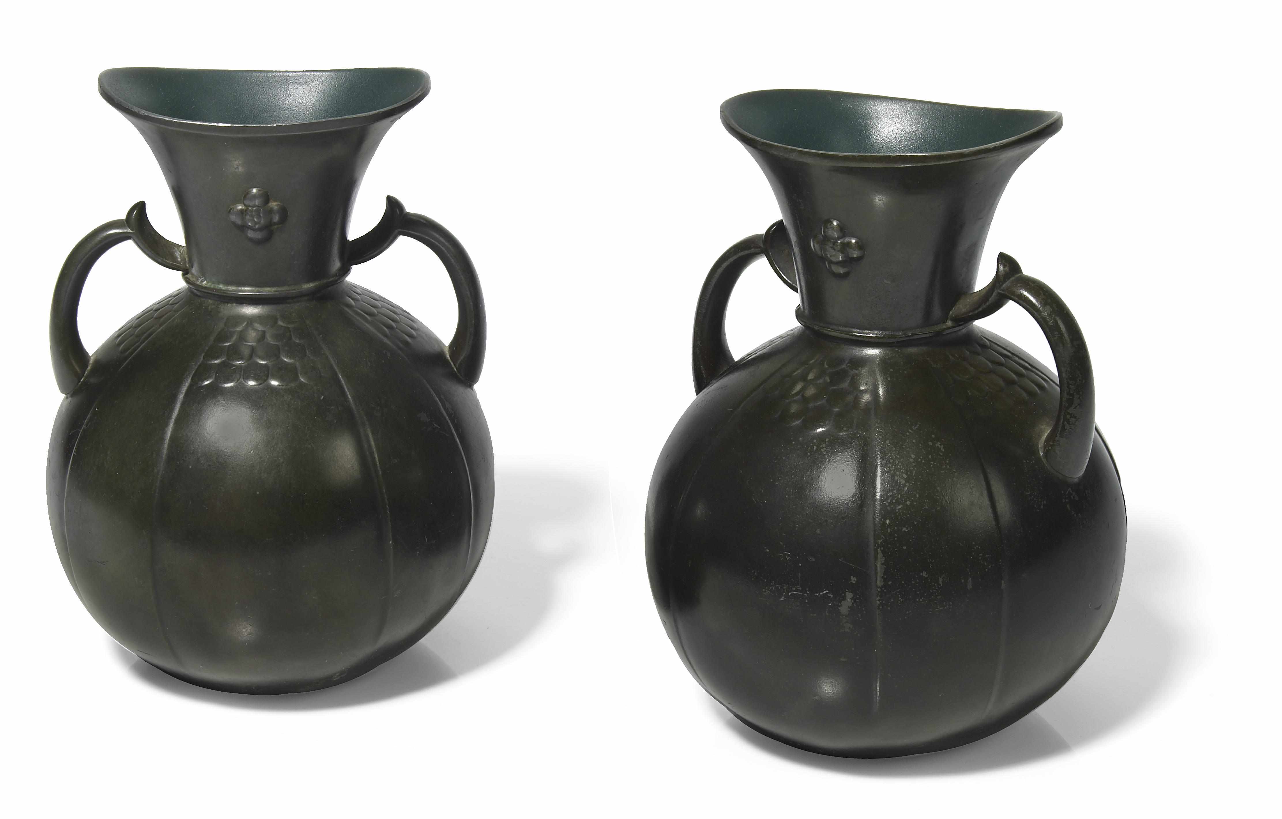 Appraisal: A pair of Just Andersen diskometal two handled vases s