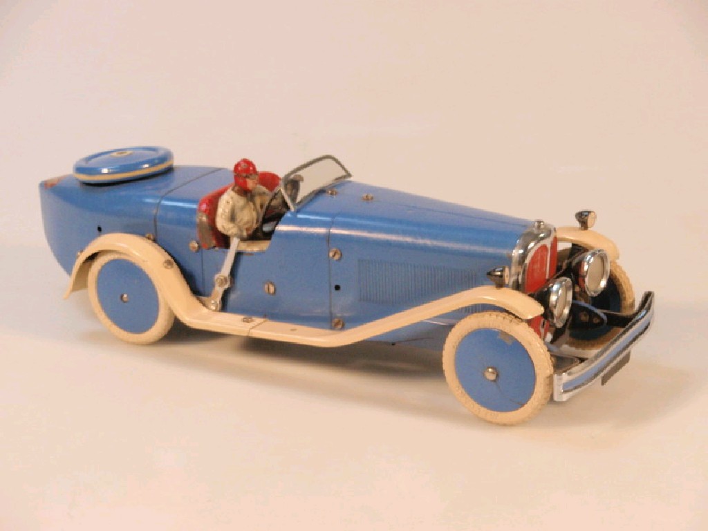 Appraisal: A Meccano number racing car with driver in blue and