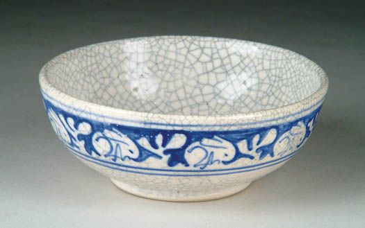 Appraisal: DEDHAM POTTERY FOOTED BOWL WITH RABBIT DECORATION Blue and white