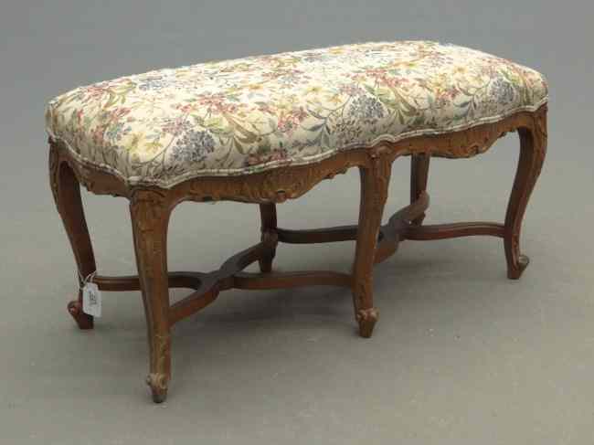 Appraisal: Upholstered bench with carved stretcher base and needlepoint seat ''