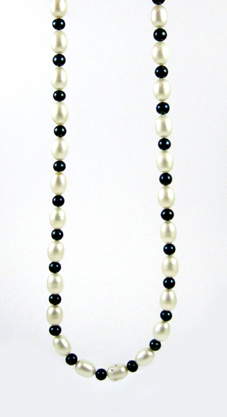 Appraisal: FRESHWATER CULTURED PEARL SILVER NECKLACE with alternating black seed pearls