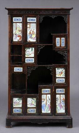 Appraisal: CHINESE PORCELAIN-MOUNTED HARDWOOD DISPLAY CABINET Incorporating open shelves pairs of