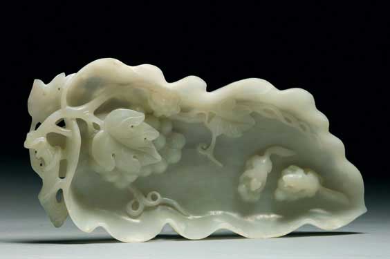 Appraisal: CARVED WHITE JADE LEAF DISH Well carved Chinese white jade