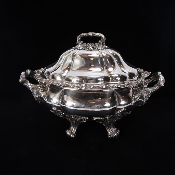 Appraisal: Sheffield English silver plated footed soup tureen with heavily chased