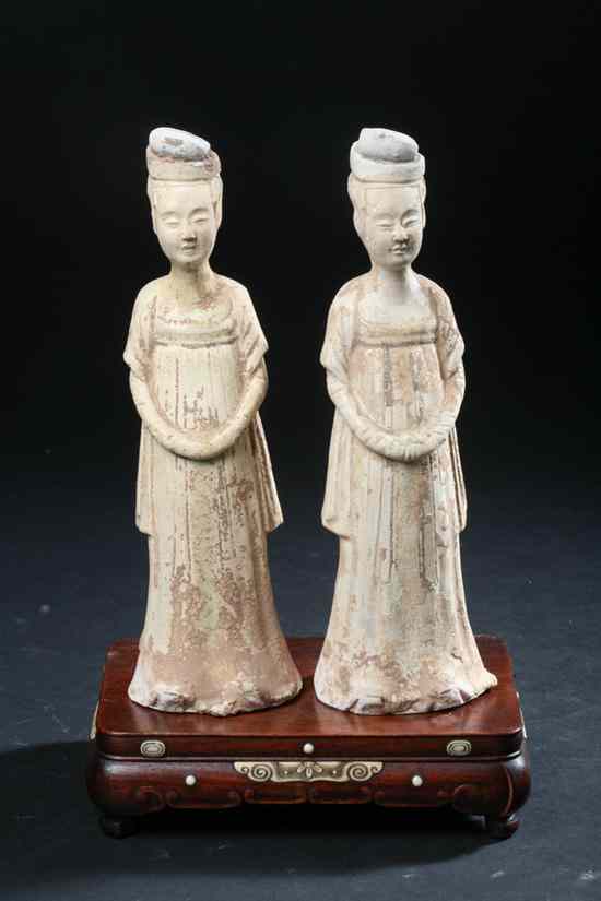 Appraisal: TWO CHINESE STREW GLAZED POTTERY FIGURES OF COURT LADIES Sui