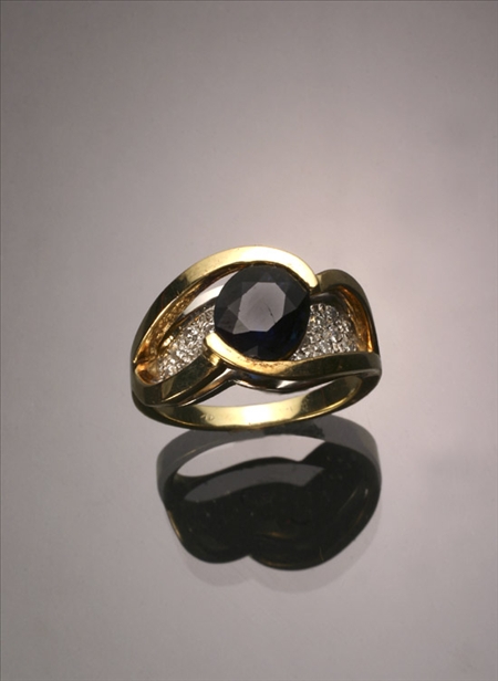 Appraisal: -Karat Yellow and White-Gold Blue Sapphire and Diamond Dinner Ring