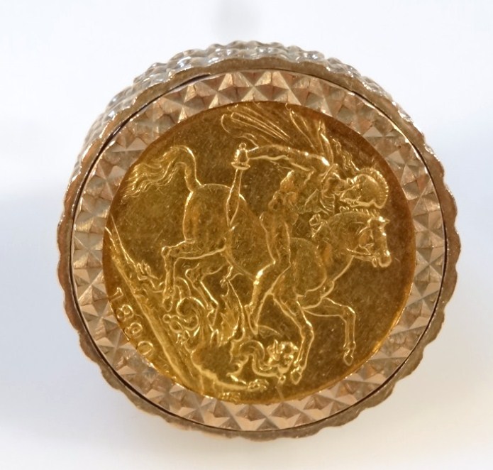 Appraisal: A Victorian gold sovereign ring the shank with an enclosed