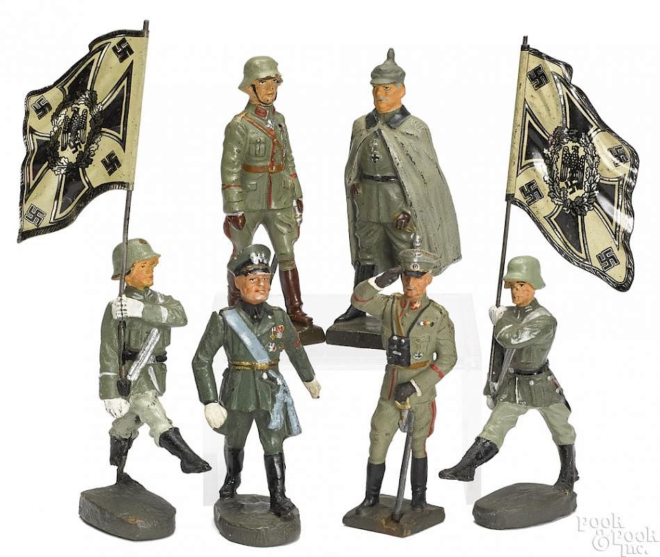 Appraisal: Lioneol painted composition personality soldiers Lineol painted composition personality soldiers