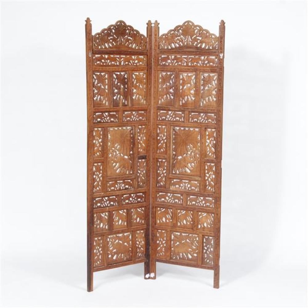 Appraisal: INDIAN PROFUSELY CARVED AND RETICULATED TWO PANEL TEAK WOOD FOLDING